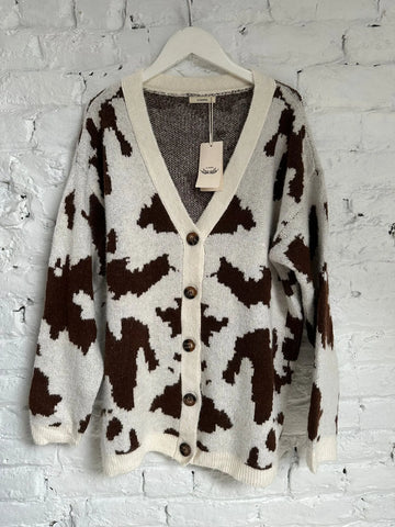 Gilet avec motifs de vache, blanc et marron, vu de face