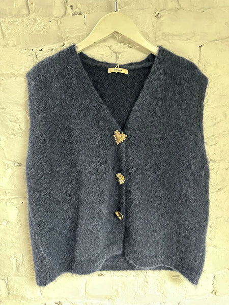 Gilet sans manches avec boutons en formes de cœurs dorés vue de face