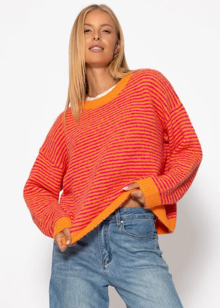 Pull lignées oranges