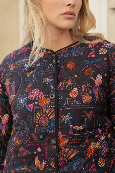 Veste à manches longues aux motifs tropicaux, taille unique, disponible également dans nos concepts store de Bruxelles