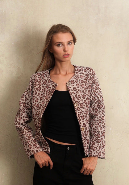 Veste sans manche avec des motifs de léopard, taille unique, disponible également dans nos concepts store de Bruxelles