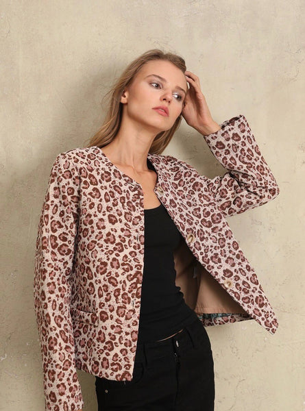 Veste sans manche avec des motifs de léopard, taille unique, disponible également dans nos concepts store de Bruxelles